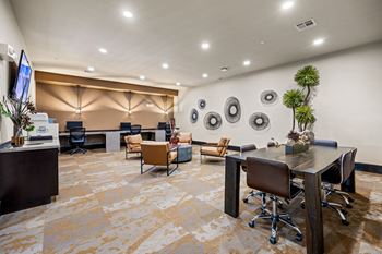 A conference room with a long table and chairs. at The Royce at 8100, Austin, Texas